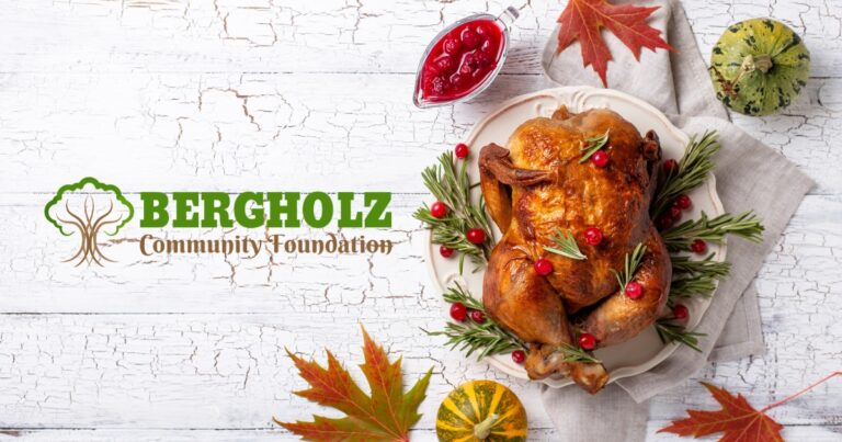 Thanskgiving turkey with white wood background and the Bergholz Community Foundation logo