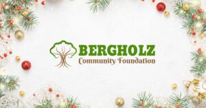 Bergholz Community Foundation logo in the middle of a graphic with a white background and Christmas ornaments and pine branches creating a border.